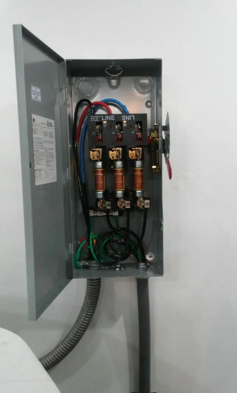Three-phase disconnect switch installed for Smoke Detector Installation in Milbank